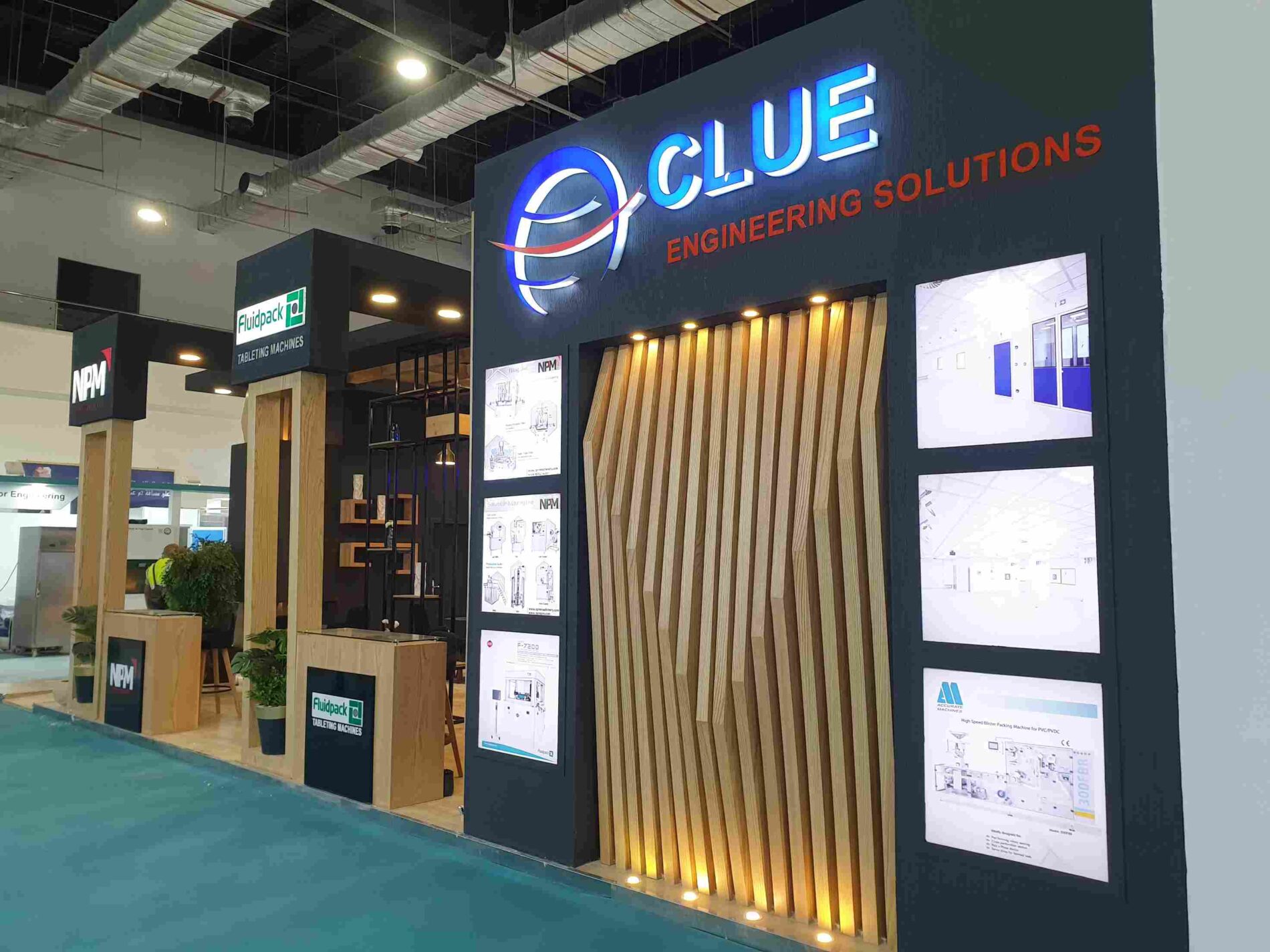 Clue Engineering Solutions booth at Pharmaconex 2021, featuring a modern and sleek design with interactive displays and advanced visual elements.