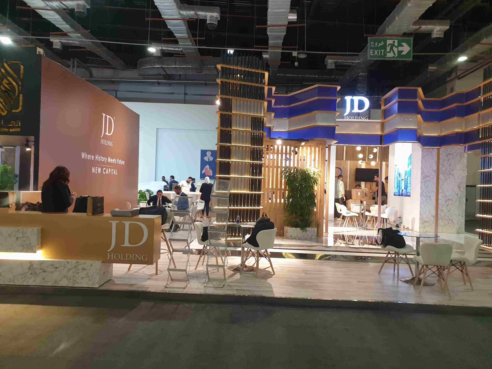 JD Holding booth at Cityscape 2021, featuring sleek modern design and interactive displays showcasing innovative real estate projects