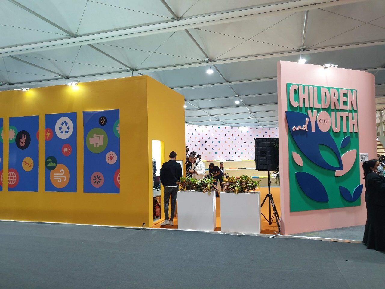 Children and Youth booth at COP27 in Sharm El Sheikh, featuring colorful, engaging displays and interactive elements that highlight the voices and contributions of young people in the fight against climate change.