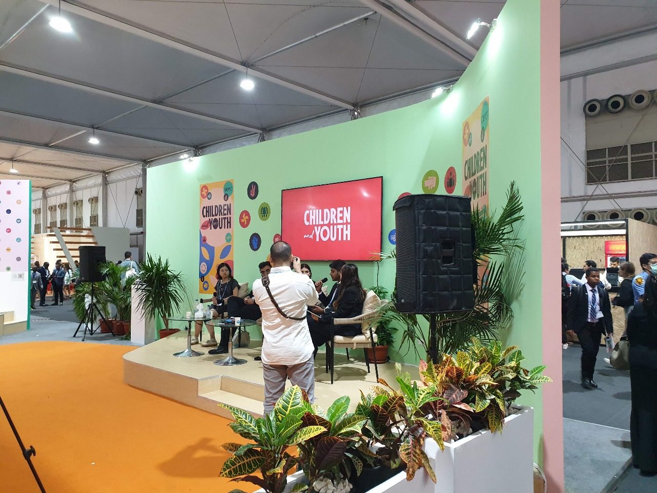 Children and Youth booth at COP27 in Sharm El Sheikh, featuring colorful, engaging displays and interactive elements that highlight the voices and contributions of young people in the fight against climate change.