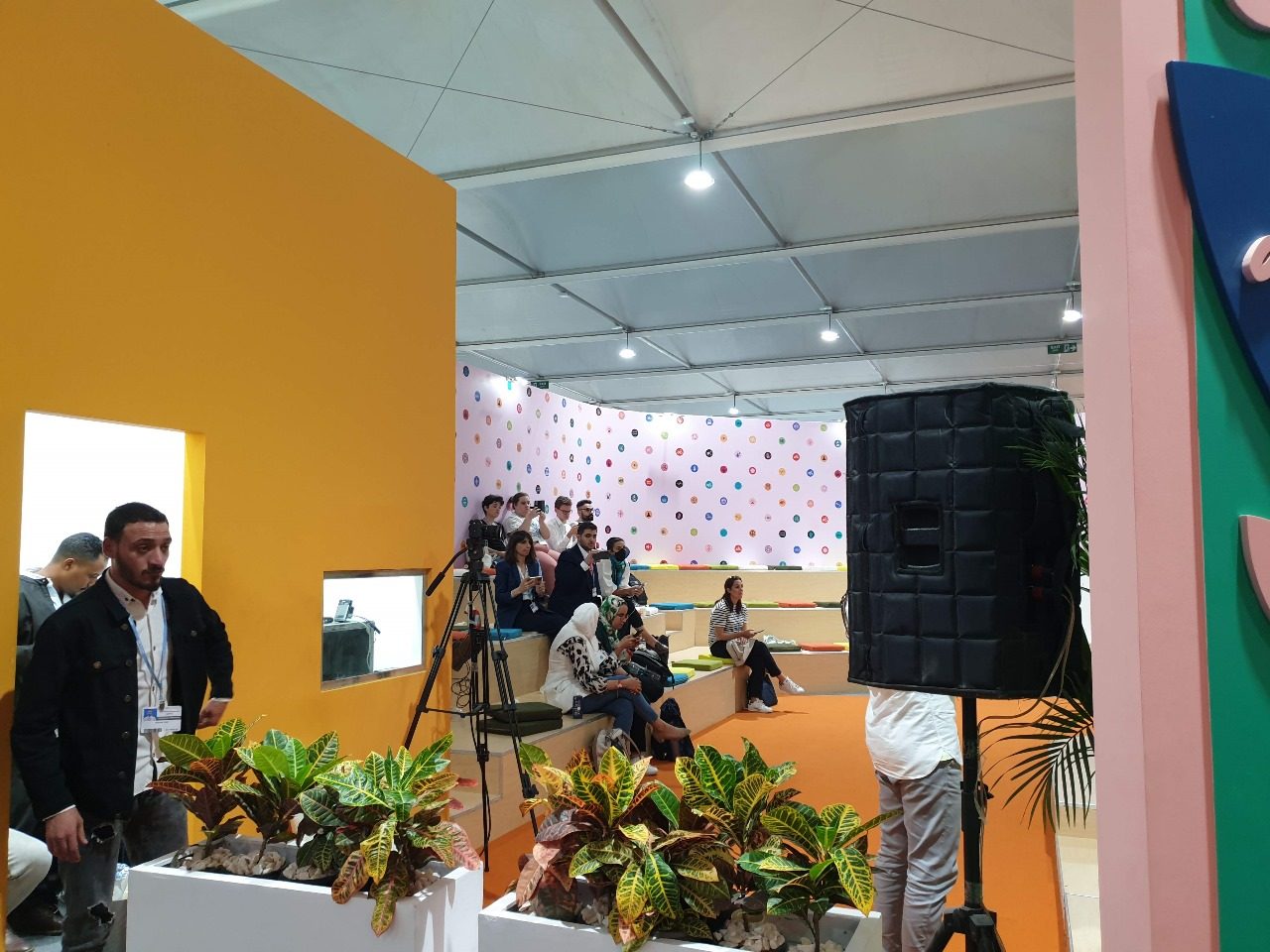 Children and Youth booth at COP27 in Sharm El Sheikh, featuring colorful, engaging displays and interactive elements that highlight the voices and contributions of young people in the fight against climate change.