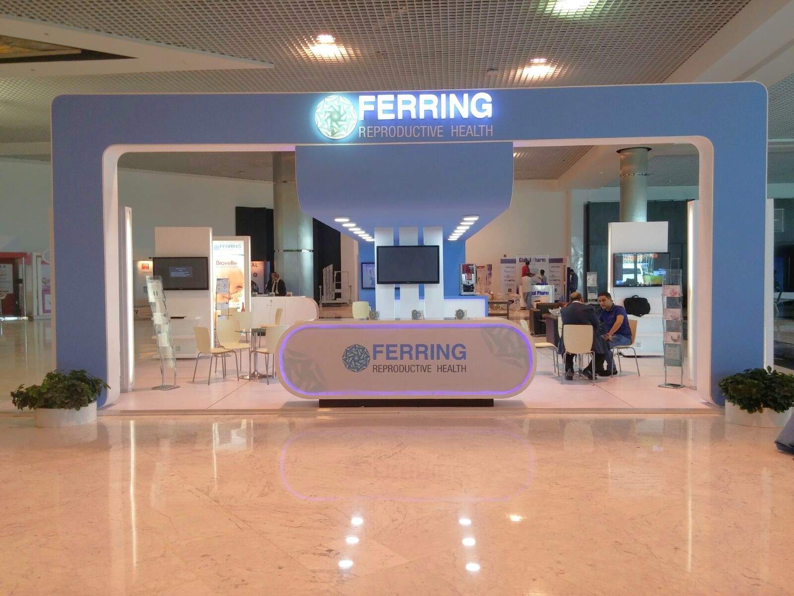 Ferring Pharmaceutical booth at MEFS 2015 in Sharm el-Sheikh, featuring an elegant and contemporary design with strategically placed displays and interactive elements that highlight their healthcare innovations.