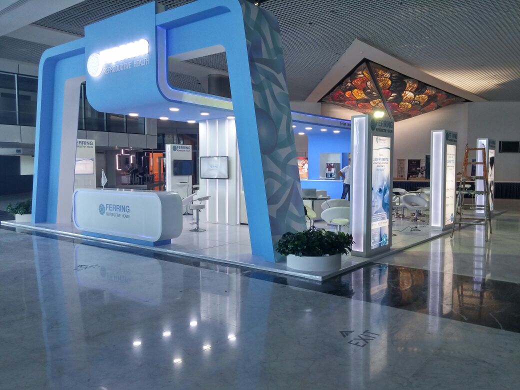 Ferring Pharmaceuticals booth at MEFS 2016 in Sharm el-Sheikh, featuring a sleek, modern design with interactive displays highlighting healthcare innovations.