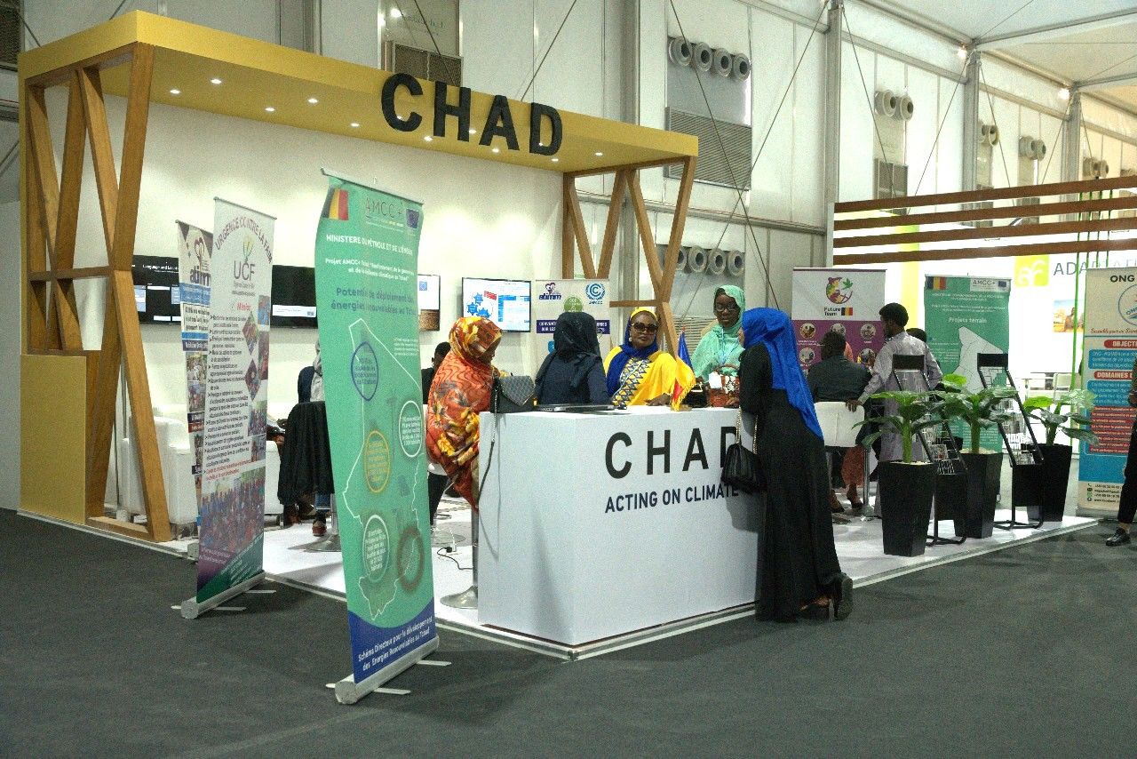 Chad booth at COP27 in Sharm El Sheikh, showcasing a vibrant and culturally rich design with traditional elements, highlighting Chad's commitment to sustainability and climate action initiatives.